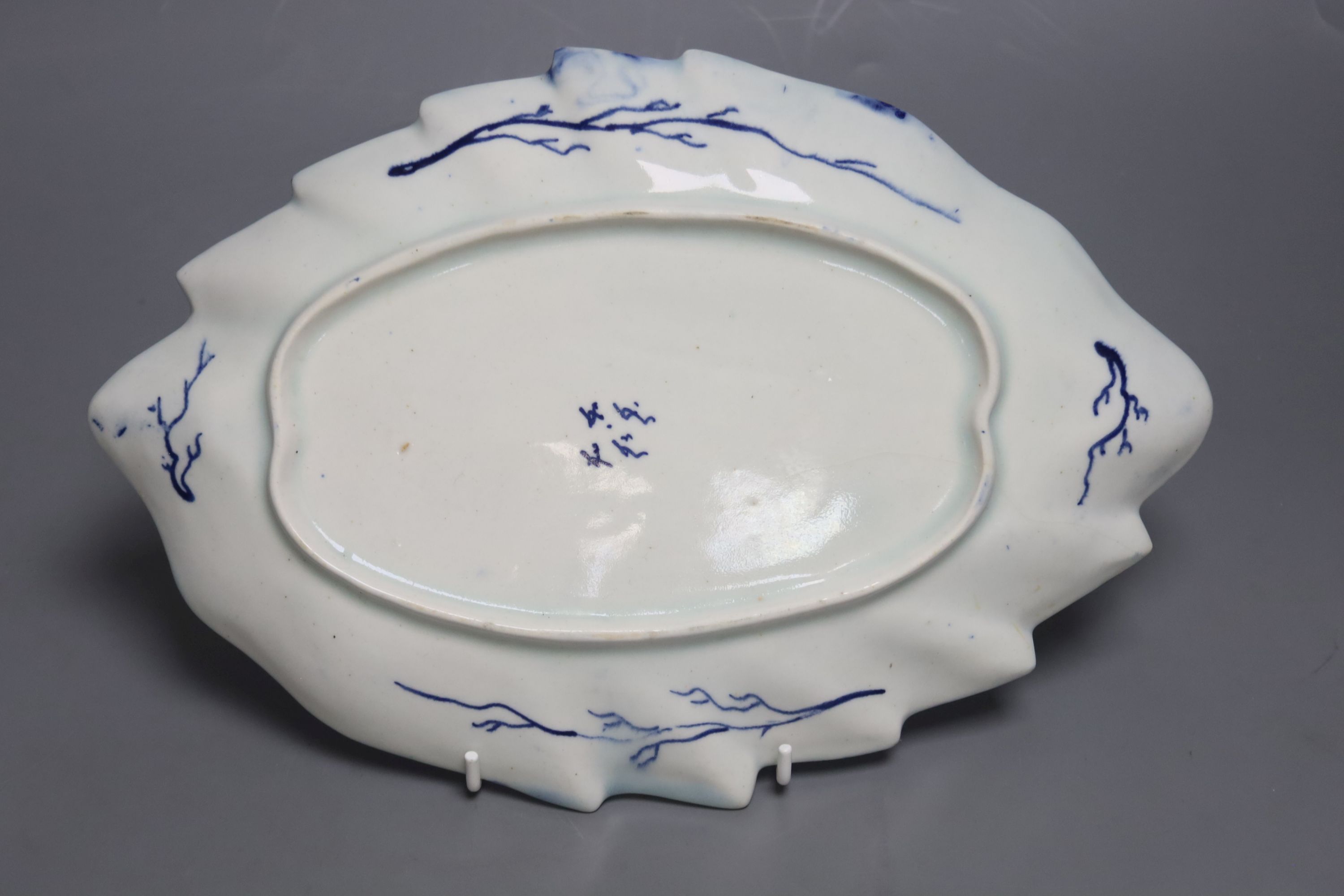 A rare Bow dish, moulded as two overlapping leaves, c.1762, four character mark, length 29cm